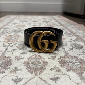 Gucci GG Marmont wide belt in black with gold buckle.